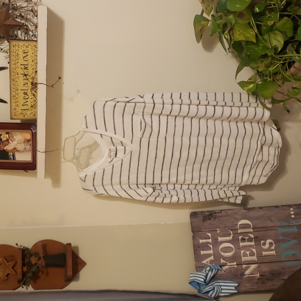 Long sleeve, very comfy loose fitting sweater.